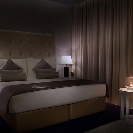 Damac Maison The Vogue Dubai Exterior photo A bedroom at the hotel