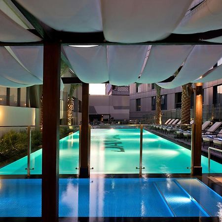 Damac Maison The Vogue Dubai Exterior photo The pool at the hotel