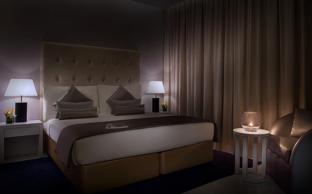 Damac Maison The Vogue Dubai Exterior photo A bedroom at the hotel