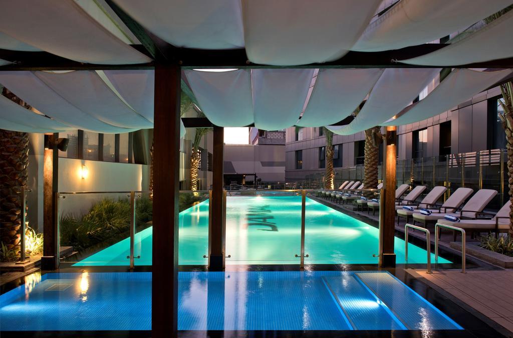 Damac Maison The Vogue Dubai Exterior photo The pool at the hotel