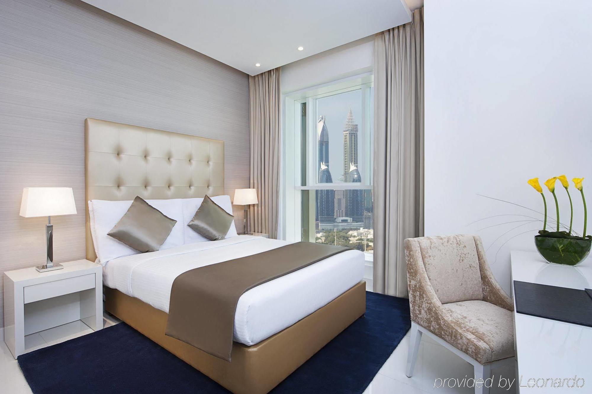 Damac Maison The Vogue Dubai Exterior photo A bedroom at the hotel