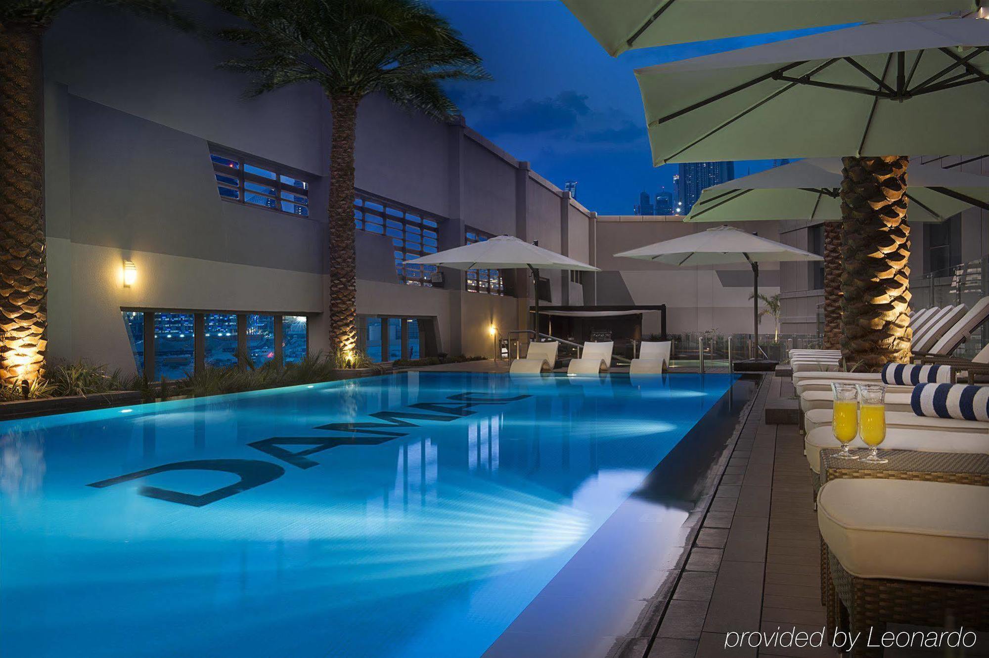 Damac Maison The Vogue Dubai Exterior photo The pool at the hotel