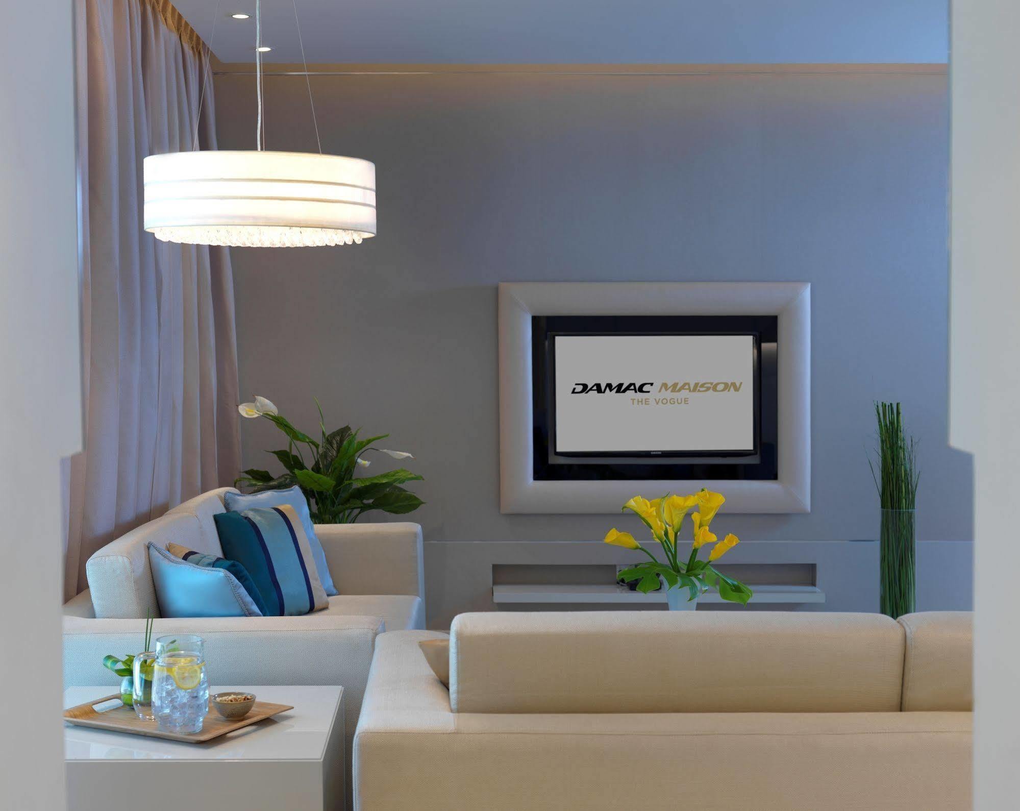 Damac Maison The Vogue Dubai Exterior photo A living room at the hotel
