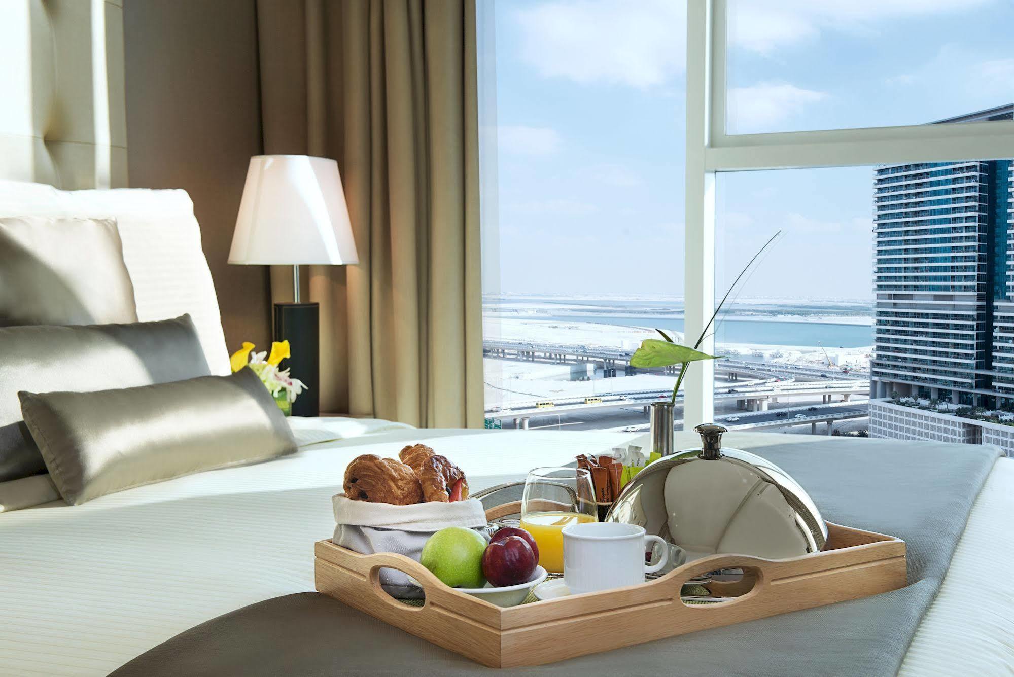 Damac Maison The Vogue Dubai Exterior photo A room service tray