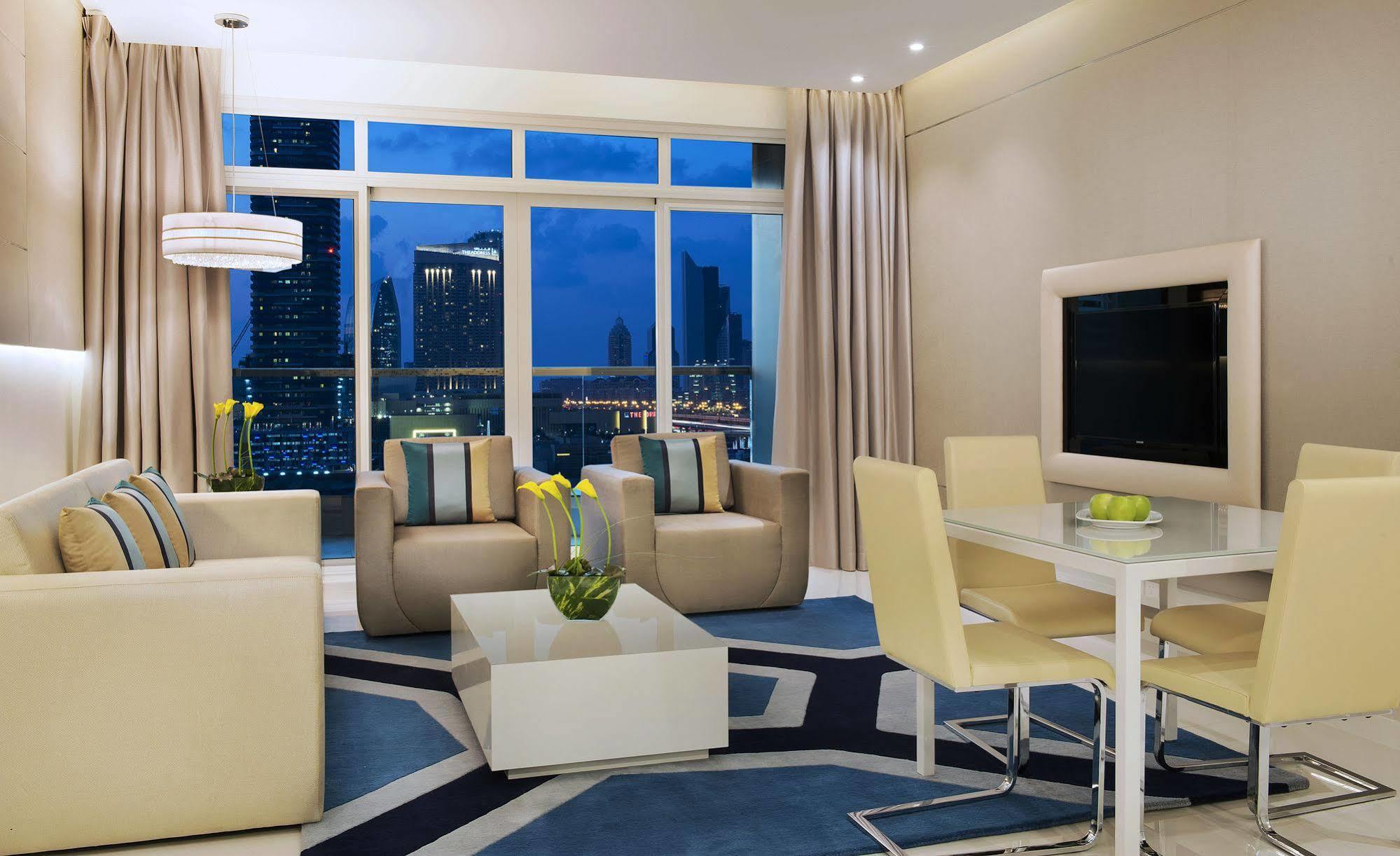 Damac Maison The Vogue Dubai Exterior photo A living room in a typical apartment