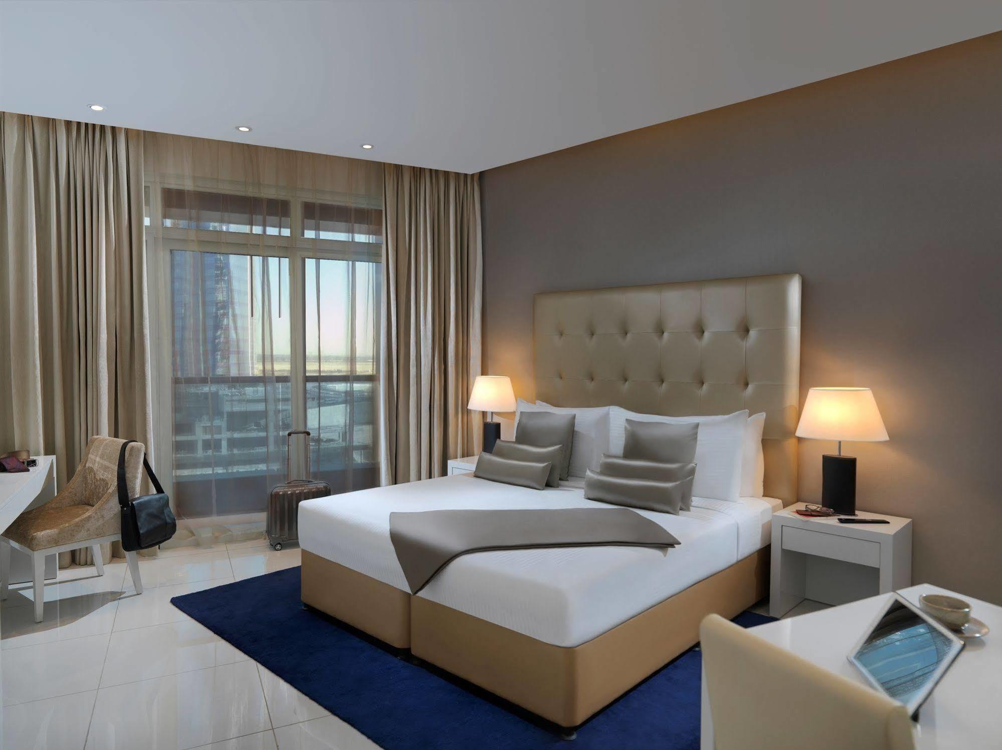 Damac Maison The Vogue Dubai Exterior photo A bedroom at the hotel