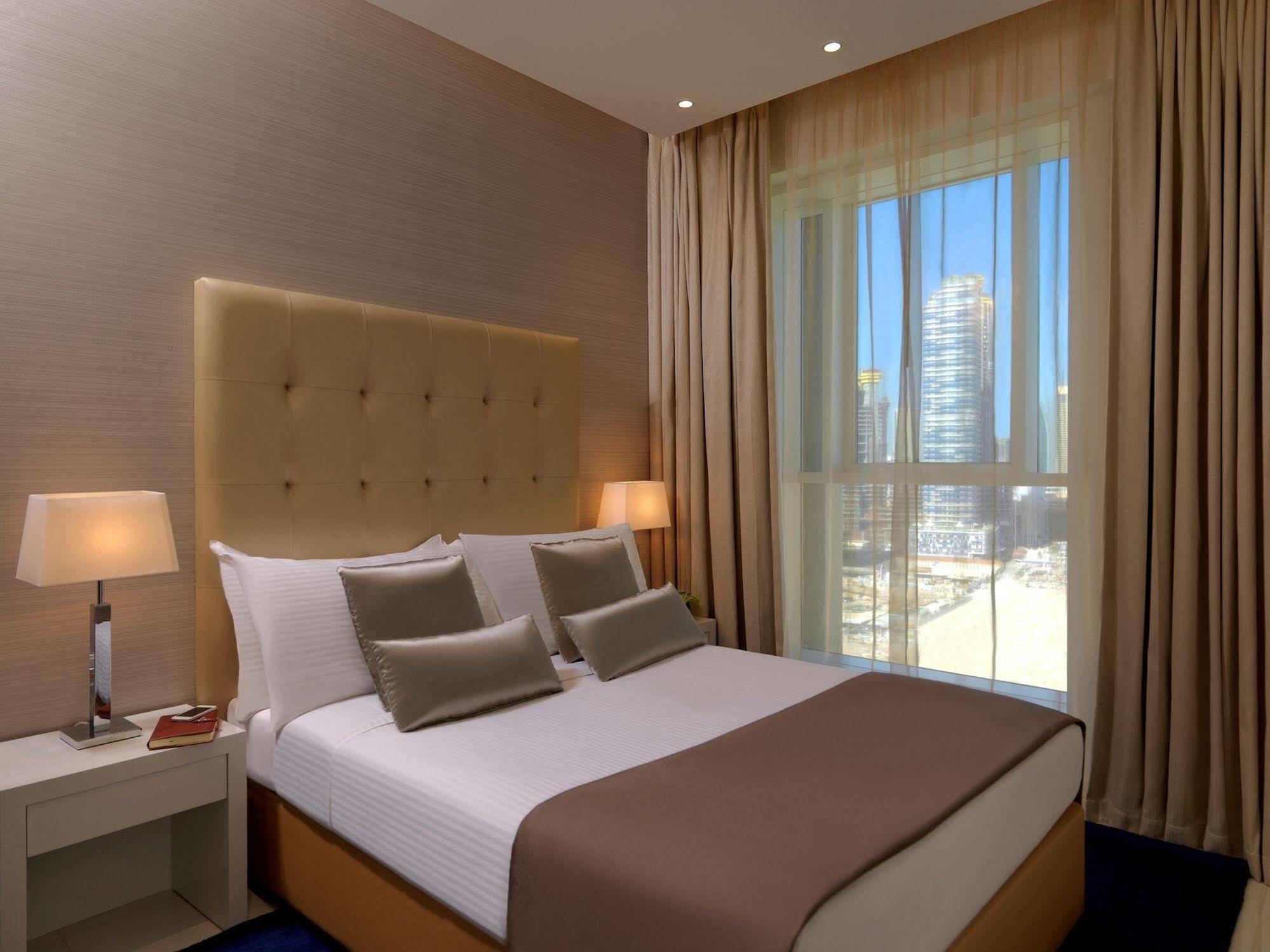 Damac Maison The Vogue Dubai Exterior photo A bedroom at the hotel